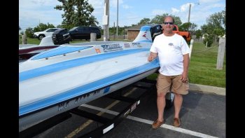 Racer Jeff Houghtaling together with his motorboat.