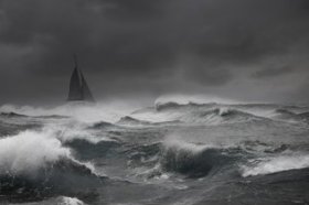 Sailing in a storm in the middle of a stormy sea.